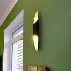 Apodis LED-seinävalaisin, musta/kulta, korkeus 50 cm, metalli himmennettävä