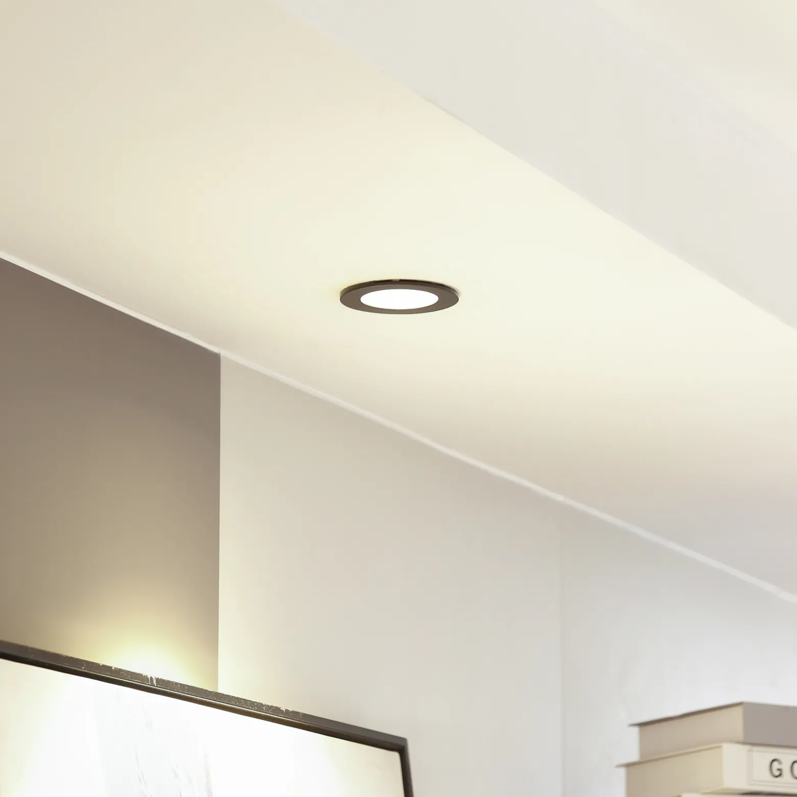 Arcchio LED-alasvalo Aryx, musta, 2700K