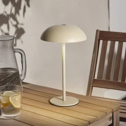 Arcchio LED ladattava pöytävalaisin Thenra, beige, seinäkiinnike
