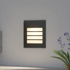 Arcchio LED upotettava seinävalaisin Zamo, rasteri, musta, IP65