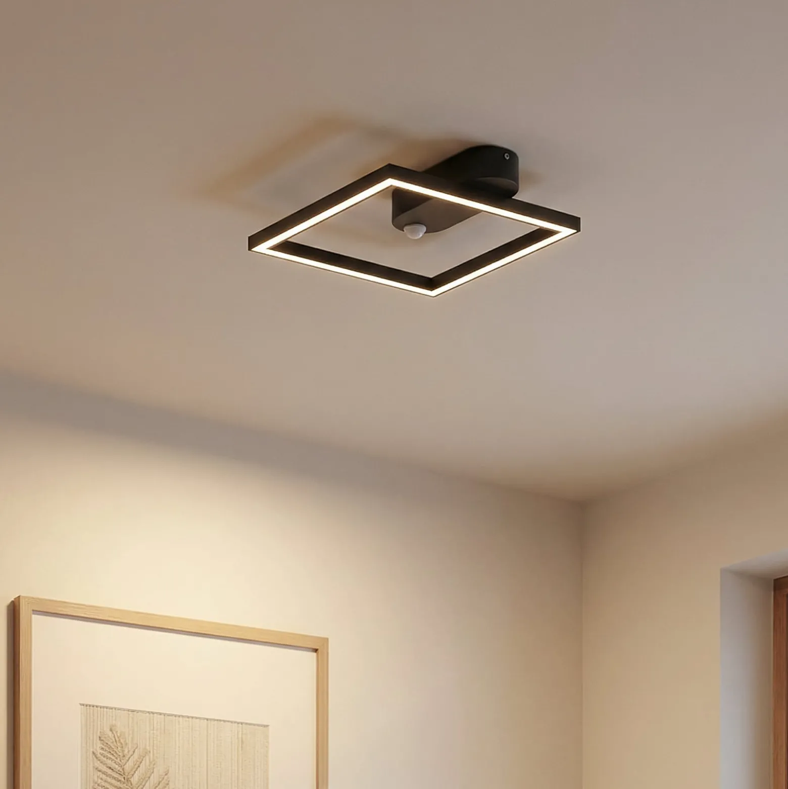 Lindby LED-kattovalaisin Yulla, 34 cm, musta, anturi