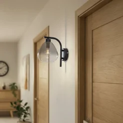 Lindby Pendura seinävalaisin, Ø 15 cm, musta, lasi